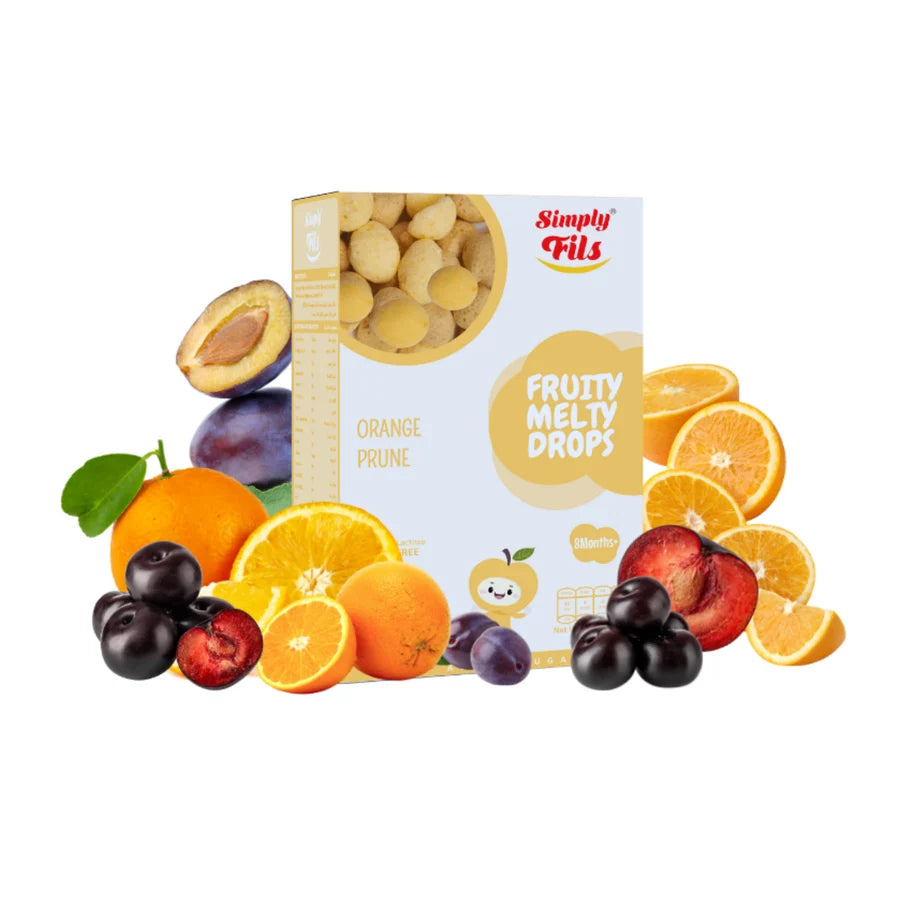 Box of Simply Fils fruity melty drops with oranges, plums, and a plum on a white background