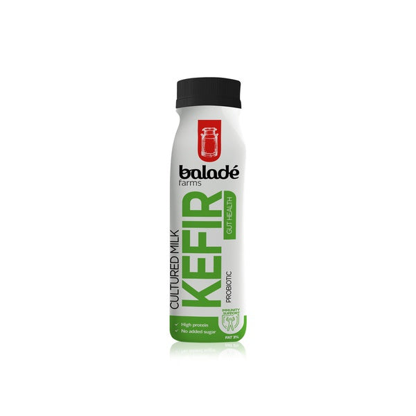 A bottle of Bolade Farms Kefir Cultured Milk Probiotic on a clean white background. The bottle is white with a black cap, featuring green and black text, and a red Bolade Farms logo.