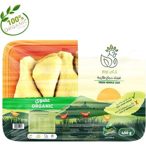 A packaged food product showing whole legs of chicken inside a clear window on a printed label with green, orange, and cream sections, plus Arabic and English text including 'ORGANIC' and 'FRESH WHOLE LEGS'.