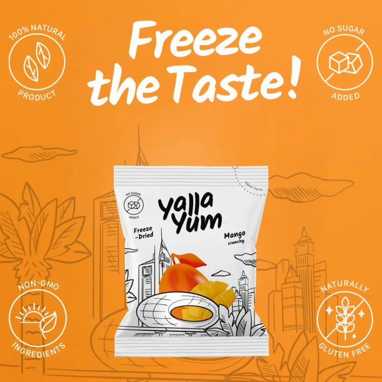 Yalla Yum mango crunch snack package on an orange background with branding elements.
