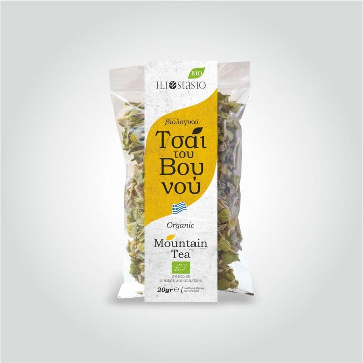 A 20g bag of Ilia Stasio Organic Mountain Tea, featuring a white and yellow label with dried green tea leaves visible through a clear plastic pouch, set against a light gray background.