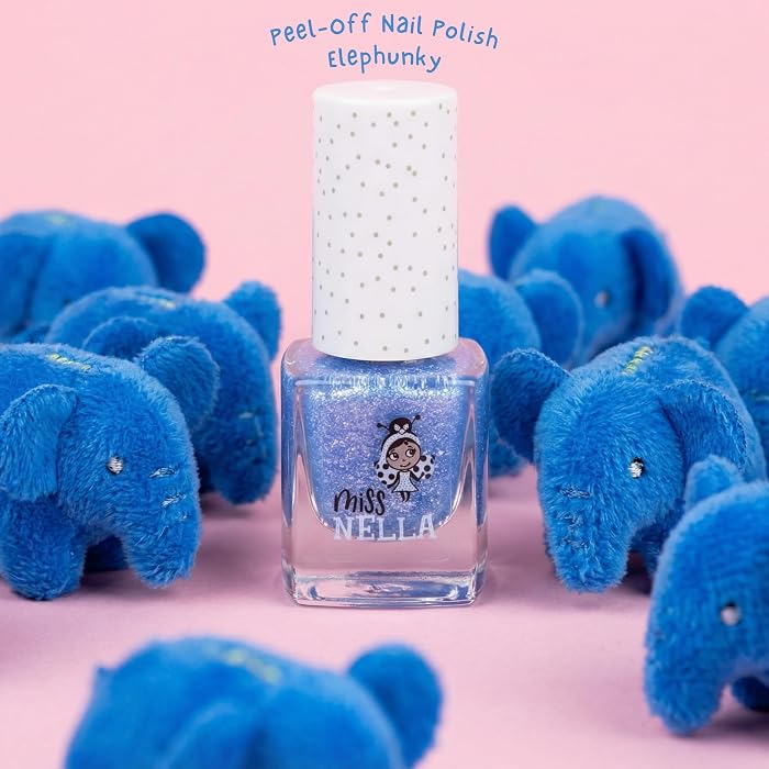 Nail polish bottle with blue glittery polish surrounded by small blue elephants on a pink background
