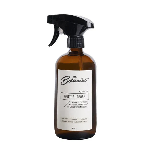 Brown spray bottle with black nozzle labeled 'The Botanist' on a white background