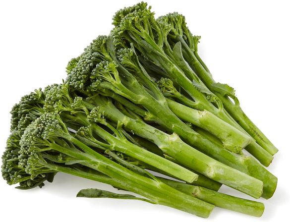 A pile of fresh green broccolini or broccoli stems with small florets, photographed on a plain white background.