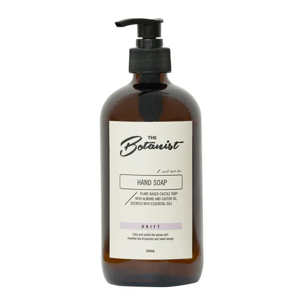 Brown bottle of hand soap with a pump labeled 'The Botanist' on a white background