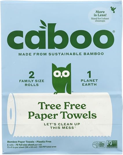 Caboo Tree Free Paper Towels packaging showing a light blue box with green branding, a cartoon owl, and a white roll illustration. Text highlights sustainable bamboo, 2 family size rolls, and 1 planet earth.