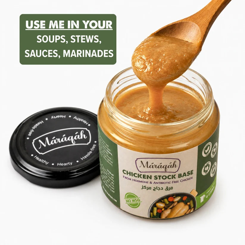A jar of Maráqah Chicken Stock Base shown open with a wooden spoon lifting the thick golden-brown stock, alongside the black lid and a green text callout that says it works in soups, stews, sauces, and marinades.
