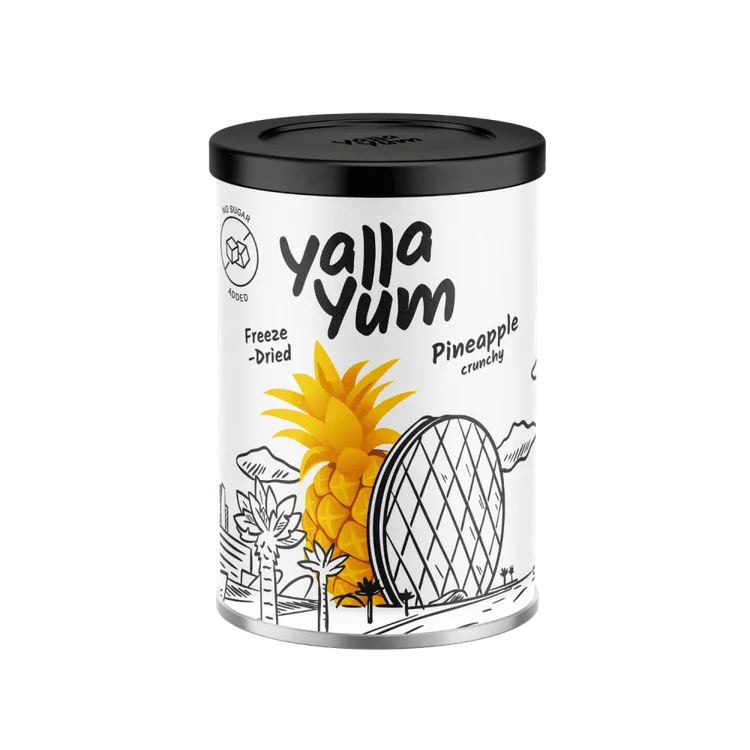 A canister of Yalla Yum Freeze-Dried Pineapple Crunchy, featuring a white label with a yellow pineapple illustration, black text, and a black lid, set against a plain white background.