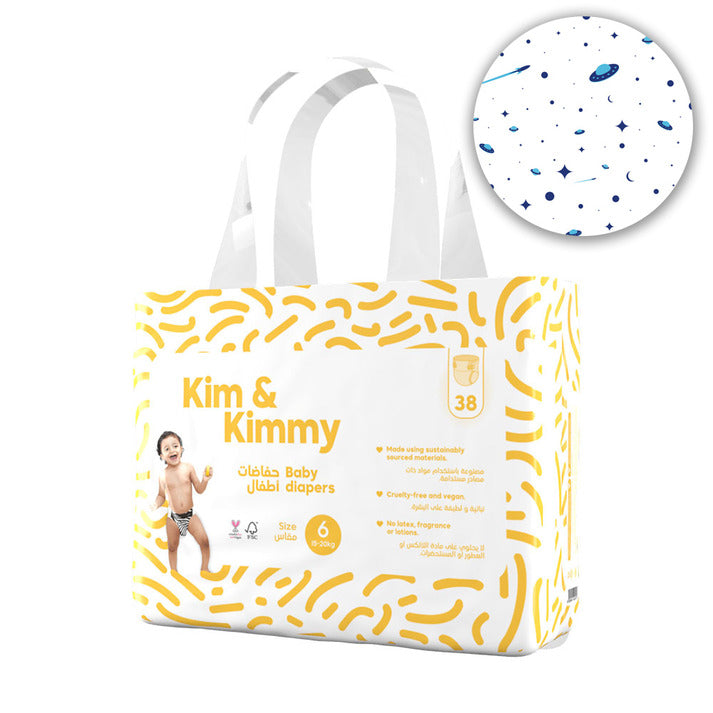 Kim & Kimmy baby diapers packaging bag with yellow abstract pattern, white handles, and a circular inset showing the diaper pattern design.