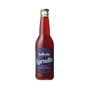 A bottle of Balholm Sprudle Eple & Brüngerer beer, featuring a dark reddish-brown glass bottle with a navy blue label and a gold crown cap, set against a plain white background.