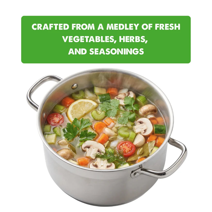 A stainless steel stockpot filled with a colorful vegetable soup, featuring a green text banner at the top that reads 'CRAFTED FROM A MEDLEY OF FRESH VEGETABLES, HERBS, AND SEASONINGS'.